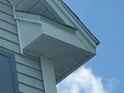 Eave, soffit, and fascia detail on a finished exterior