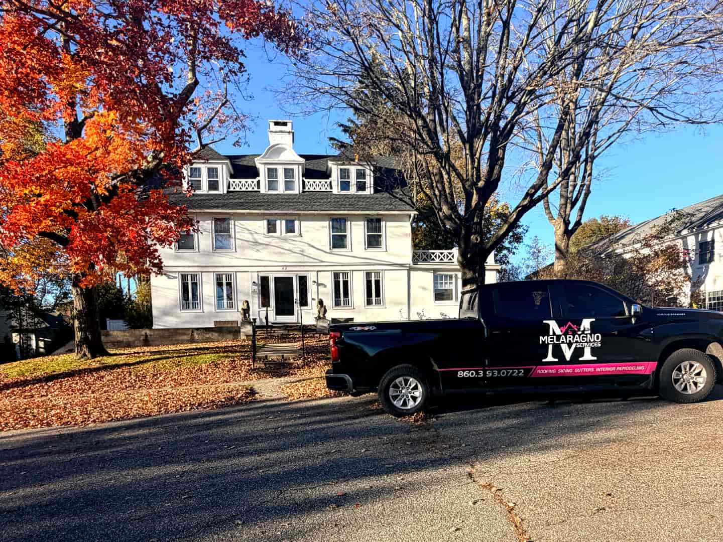 The Melaragno office at 82 West St in Litchfield, Connecticut, with a company truck out front.