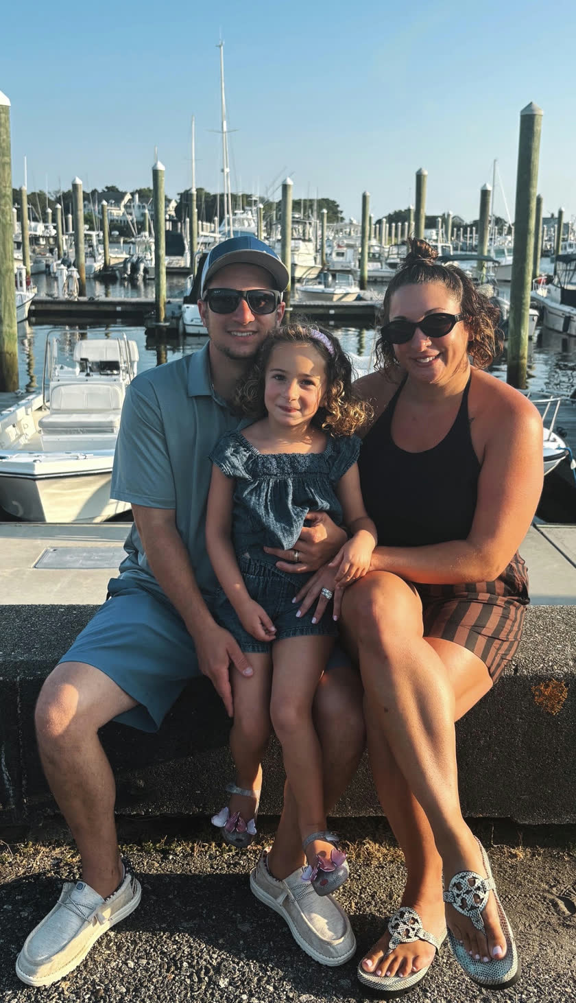 David Melaragno with his family at a marina.