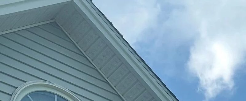 Finished lap siding and soffit detail on a home